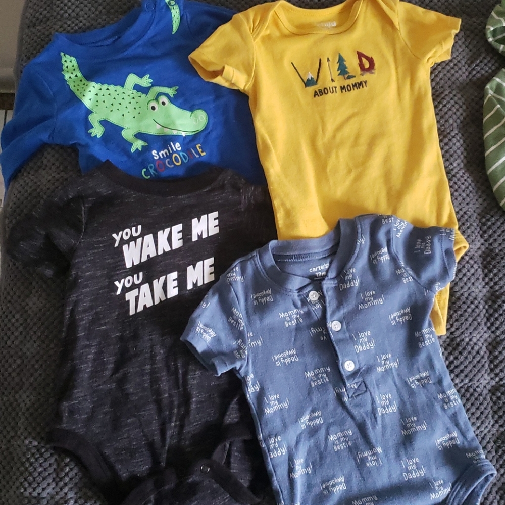 Lightly loved baby onesies